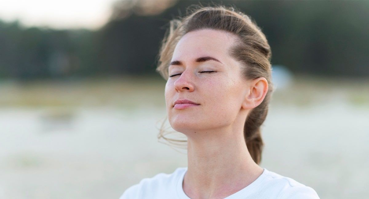 lady taking a deep breath